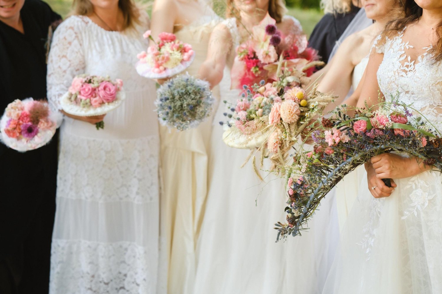  many brides hold their wedding bouquet in their hands